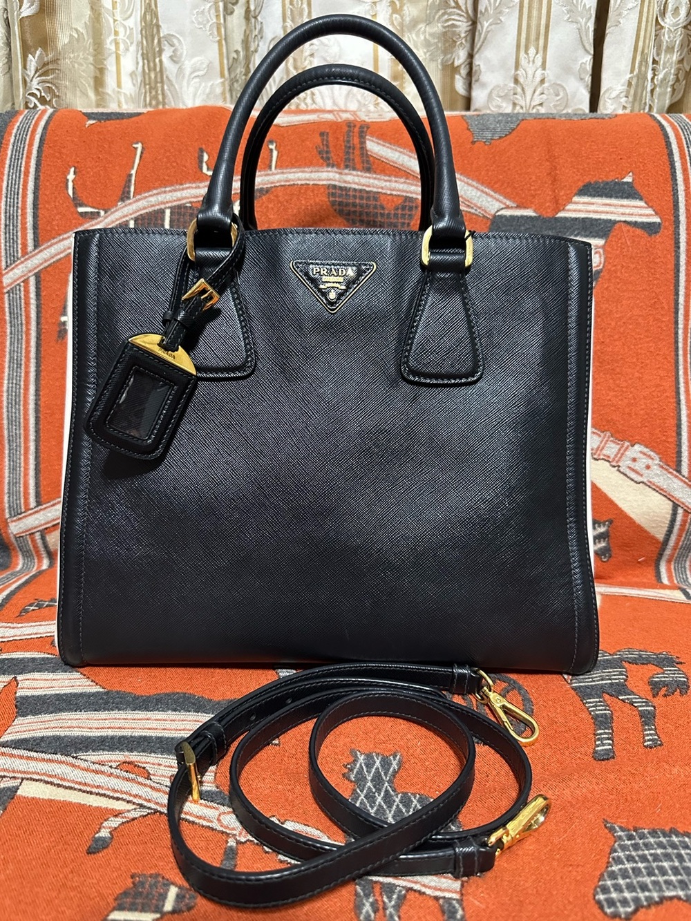 Prada Black Saffiano Leather Satchel with Gold Hardware and Detachable Strap